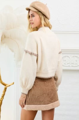 Tan sweater with mocha trim