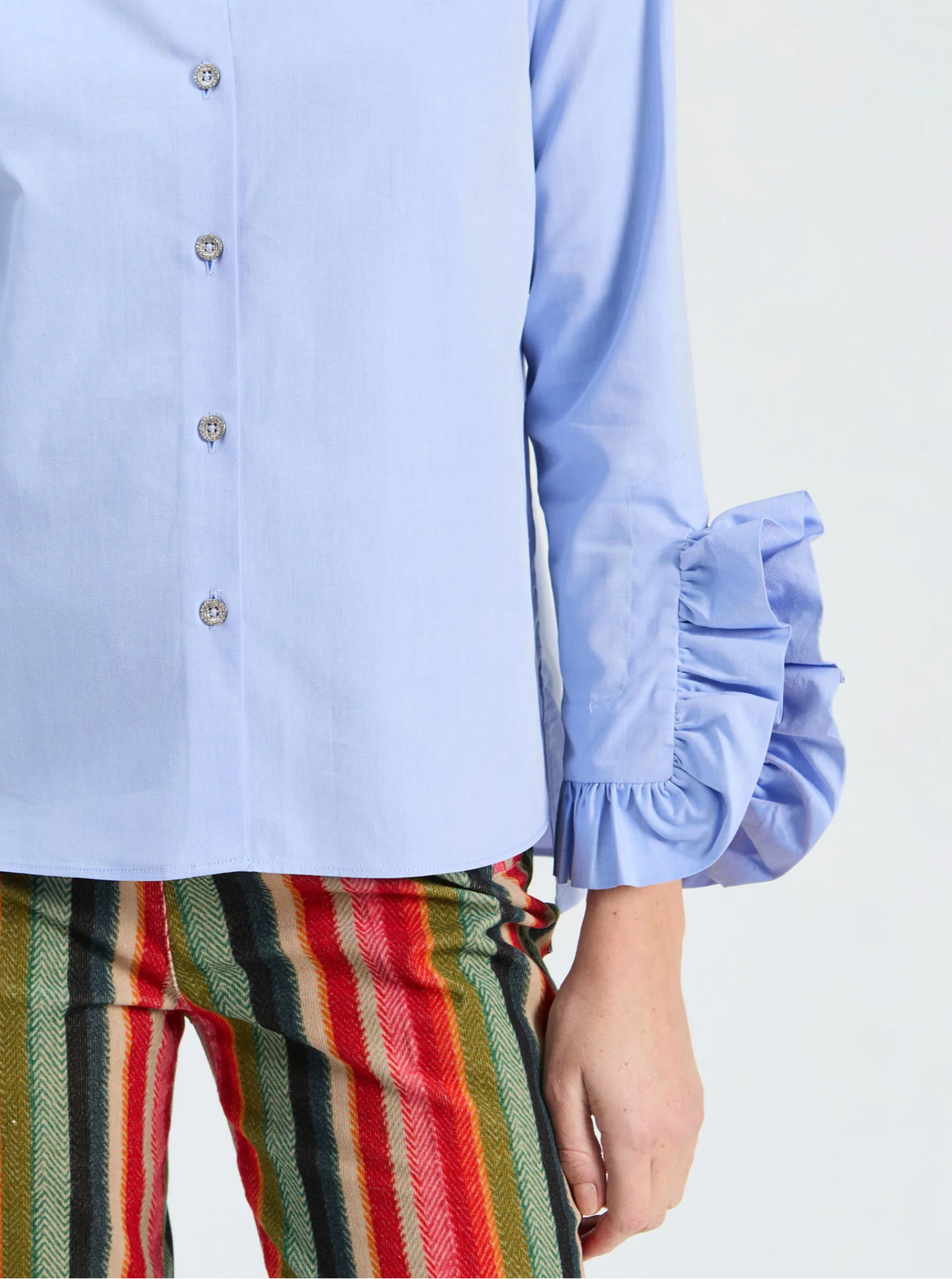 BLUE SHIRT WITH SIDE RUFFLES